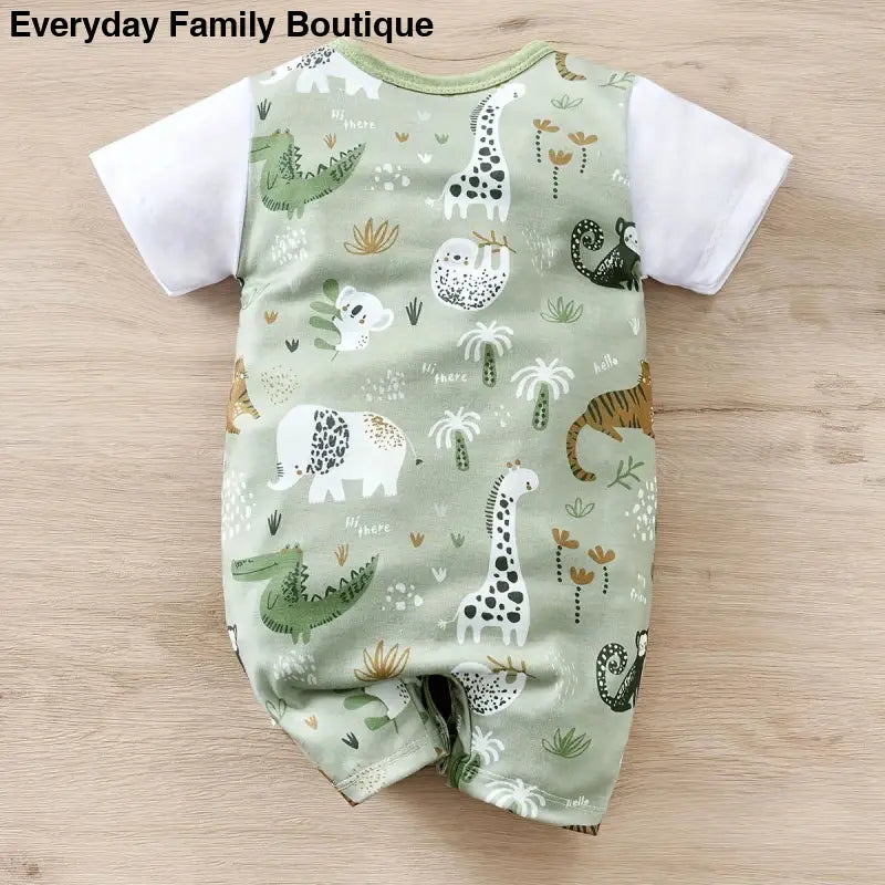 Baby romper with white sleeves and a mint green safari animal print pattern.