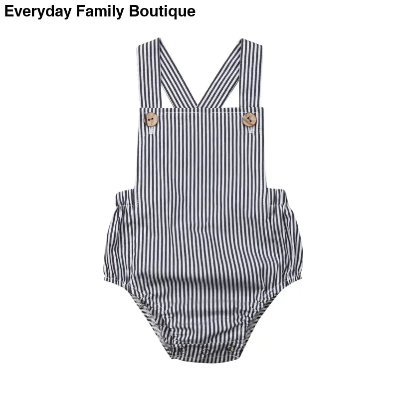 Navy and white striped baby romper with shoulder straps and button details.