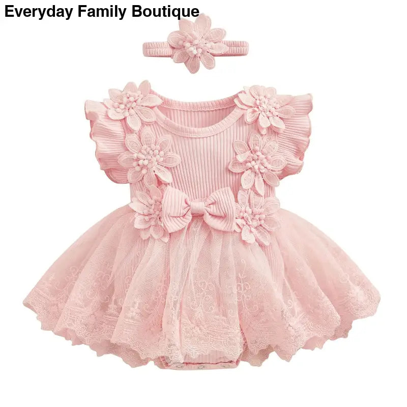 Pink floral tutu dress with matching headband for a baby girl.