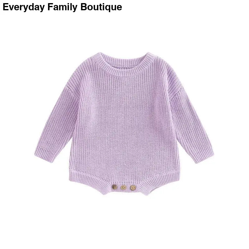 Lavender knitted baby romper with button details at the bottom.