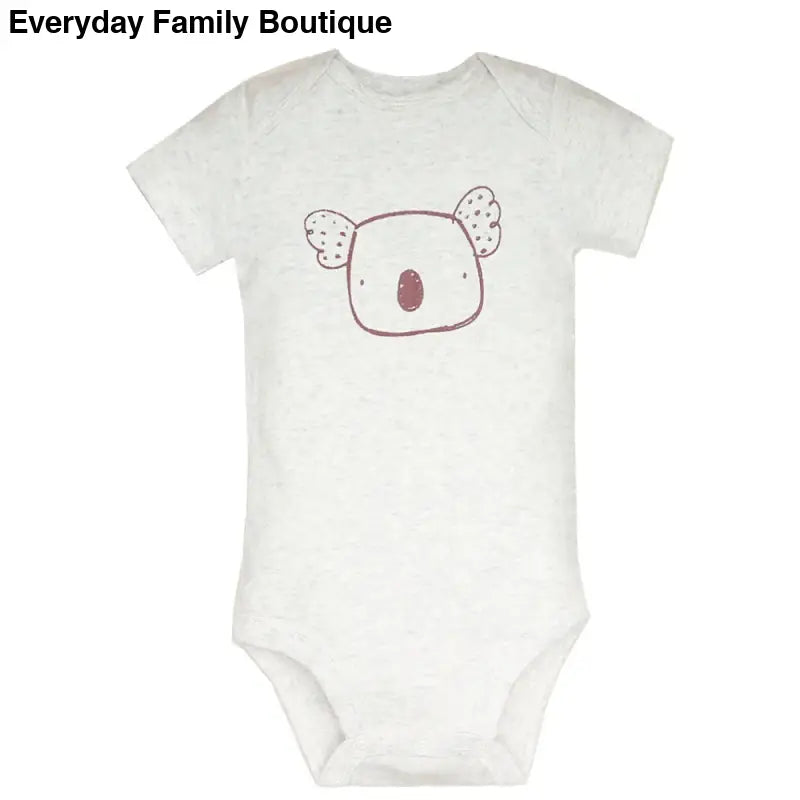 White baby onesie with a simple koala face design.