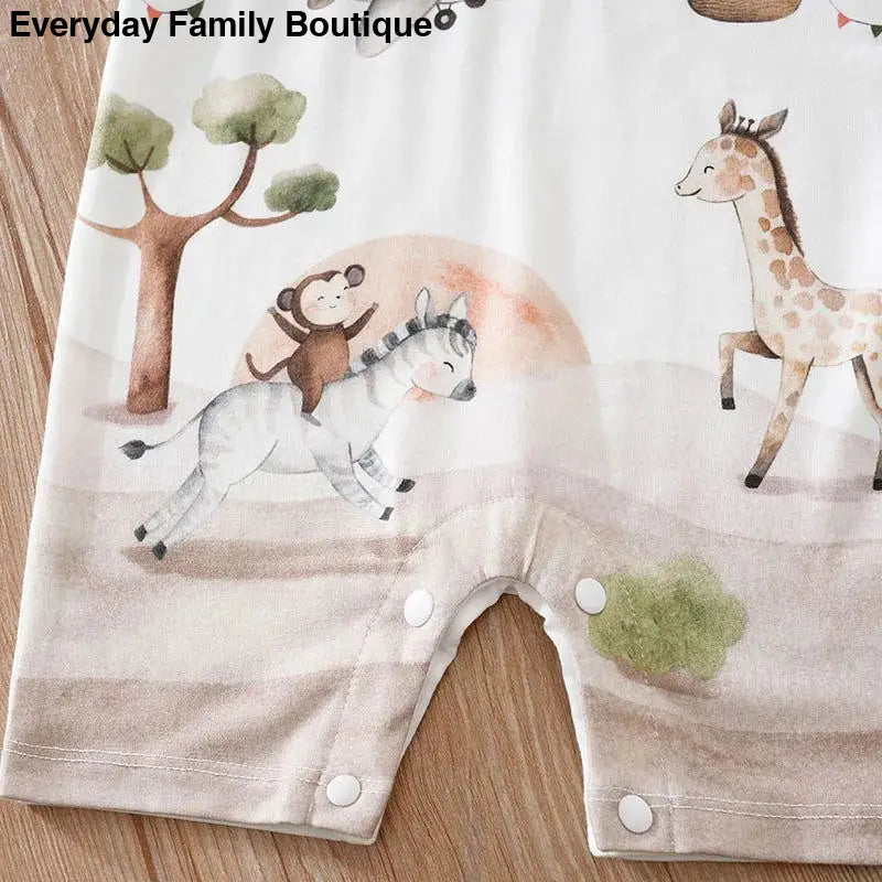 Baby romper with whimsical safari animal illustrations.